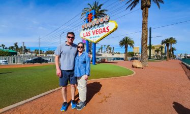 Couple at Las Vegas Welcome Sign during Instagram photo tour.