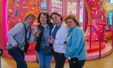 Las Vegas Downtown Fremont Street Instagram Tour with vibrant donut decor.