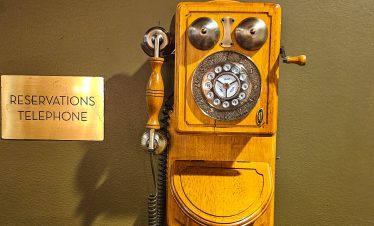 Vintage wooden rotary phone for reservations at Las Vegas Downtown Fremont Street.