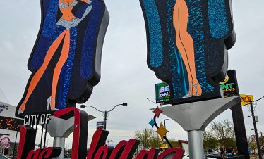 Las Vegas Fremont Street giant neon signs with women figures.