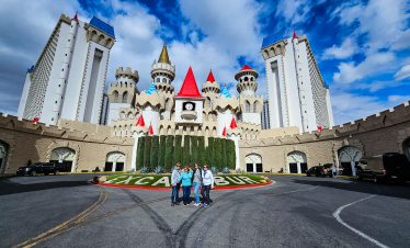 Excalibur Hotel and Casino in Las Vegas with castle design and blue sky.