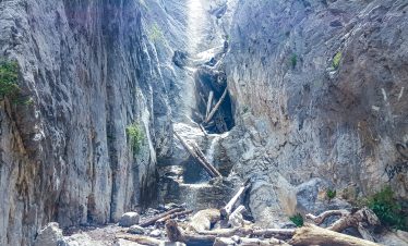 Scenic view of a waterfall cascading down rocky cliffs in Mt Charleston area.
